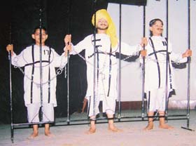 Students of Guru Nanak Dev Public School perform as Bhagat Singh, Sahdev and Rajguru at their annual function in Amritsar recently