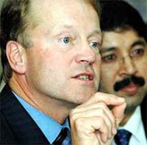President & CEO Cisco Systems John Chambers and Minister for IT & Telecommunication Dayanidhi Maran address a press conference in New Delhi