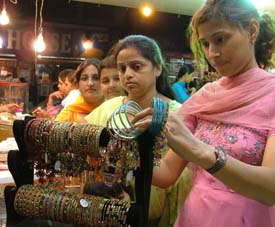 Women buy bangles for Karva Chauth in Ludhiana on Wednesday