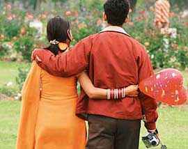 COMFORTING COMMITMENT: A couple locked by love moves towards wedlocks haven. 