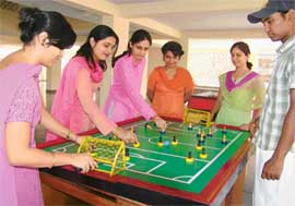 Teachers of The Gurukul, Sector 20, Panchkula trying to master Subbuteo or Table Football. 