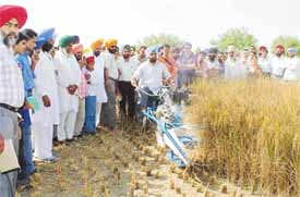 Farm machinery displayed at PAU in Ludhiana on Thursday