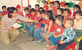 Children of Holly Hock Nursery School at a quiz competition organised on the school premises in Ludhiana on Friday.