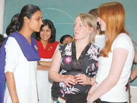 Students from Derby (UK) who are on a visit under the youth exchange programme interact with students of MGN School in Jalandhar on Saturday. 