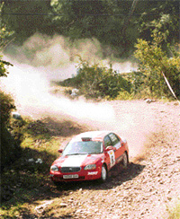 Team MRFs Arjun Rao Aroor and co-driver Chandramouli negotiate a treacherous special stage of the Power M1 Rally on Saturday