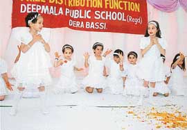 Students present a cultural show at the annual prize distribution function of Deepmala Public School, Dera Bassi on Sunday.