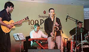 Sunny Jain, Ben Stivers and Stever Welch perform during a presentation by the Seagrams 100 Pipers, The Legend from Scotland in Ludhiana on Saturday night. 