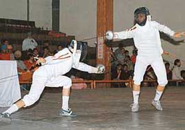 Players in action during the Punjab Junior Fencing Championship in Ludhiana on Sunday.
