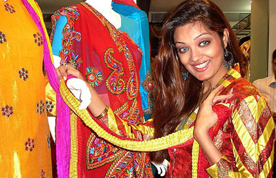 Former Miss Kolkata Sheena poses at the inaugural ceremony of an apparels showroom in Guwahati on Sunday