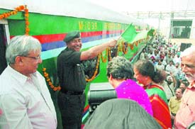 Lieutenant-General Mandhata Singh, GOC, 11 Corps, flags off 21 three-tier coaches in Kapurthala on Monday.  A Tribune photo
