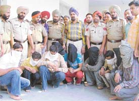 The arrested members of a gang of robbers and murderers in Ludhiana on Monday