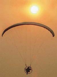 A para motor flies through the skies over Chandigarh during a demonstration organised by the Parachute Regiment in Chandigarh