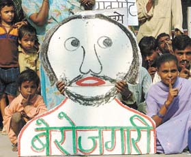 Protesters at a dharna demanding increase in employment opportunities at Jantar Mantar in the Capital