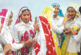 Students of Swami Ram Tirath Public High School, Mohali, wait to perform at their annual prize distribution function on Wednesday. 