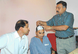 Dr A. Jindal explains the surgery technique to mediapersons at NINS, Brain and Spine Hospital, Sector 34, Chandigarh.