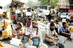 Beggars and physically-challenged people sitting on a dharna near the Supreme Court