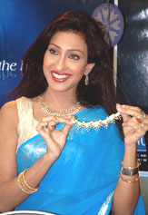 Bengali actress Rituparna Sengupta unveils a range of branded jewellery in Kolkata on Wednesday evening. 