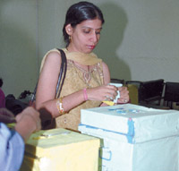 A woman casting her vote for JNU Students Union election on campus in the Capital on Thursday.