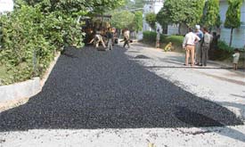A road being recarpeted in Kitchlu Nagar which has drawn the ire of local residents