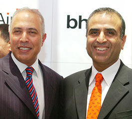 Chief Executive Officer of Vodafone Group Plc Arun Sarin (left) with Chairman and Group Managing Director of Bharti Televentures Sunil Mittal in New Delhi on Friday.