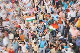 Cricket fans celebrates Indias victory over Sri Lanka.