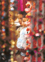 Brightly-coloured torans attract Divali shoppers in Ludhiana markets