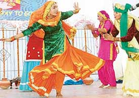 Girls perform giddha during the concluding session of the Panjab University Zonal Youth Festival at Government College, Sector 11, Chandigarh