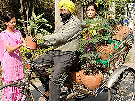 Comedian Jaspal Bhatti celebrates the Divali the green way by presenting potted plants to his friends on the eve of the festival in Chandigarh on Monday.