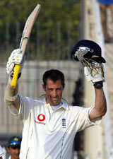 Englands Marcus Trescothick celebrates after completing his century on the opening day of a three-day match against Pakistan Cricket Board Patrons XI at the Pindi