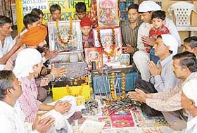 Vishwakarma puja being performed by residents at the Sector 48, scooter market