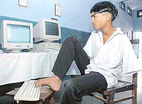 Sunil Kumar can use Microsoft Word and type on a computer with his toes