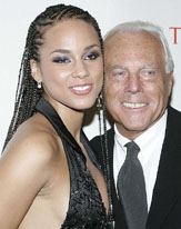  Alicia Keys poses with designer Giorgio Armani at "The Black Ball", a fundraiser hosted by Keys, on Thursday in New York. The event was the finale to a Global Health Summit, where leaders in medicine, government and business convened to develop solutions to health crises.