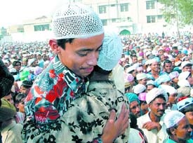 Teenagers exchange greetings on Id-Ul-Fitr at the Idgah in Jalandhar on Friday. 