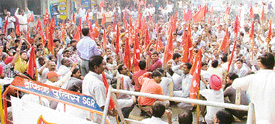Workers of Rockman Cycle Industries protest against the closure of the cycle parts wing at Focal Point in Ludhiana on Friday