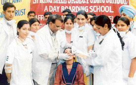 Students of Spring Dale Senior Secondary School at a dental check up camp organised on the school premises