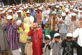 Muslims offer prayers during Id celebrations in Ludhiana on Friday