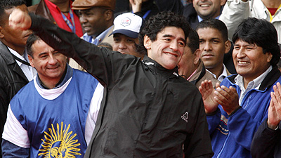 Argentine soccer legend Diego Maradona gestures at an anti-Bush rally