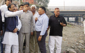 DPCC president Ram Babu Sharma with other Congress leaders at the Yamuna Ghat to see the arrangements for the forthcoming Chhath Pooja in the Capital on Saturday