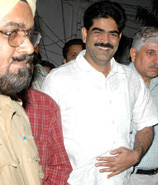 Elusive RJD MP from Siwan Mohammad Shahabuddin, who was arrested by a team of the Bihar Police from his official residence, is taken to Parliament Street police station in New Delhi on Saturday