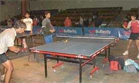 Sunny Maltu of Amritsar and Vandit of Jalandhar in the pre-quarter final match of the 16th Punjab State Ranking Table Tennis Tournament in Ludhiana on Saturday