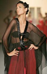 A model presents a creation by Thai designer Chaichon Sawantaraj during the Elle Fashion Week, 2005, in Bangkok on Sunday.