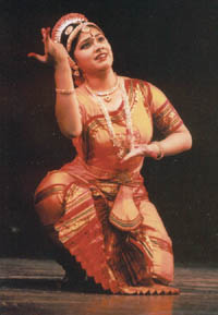 Renuka strikes a mudra.
