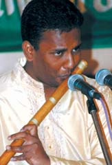 Rajat Prasanna plays the flute at the Hemant Utsav in Jalandhar on Sunday.