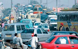 A  traffic jam at Rama Mandi Chowk in Jalandhar on Sunday. Vehicular congestion and jams have become an everyday affair on the G.T Road.