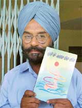 Prof Jagmohan Singh with his book “Udey to Aast Hon Tak” which was released in Ludhiana on Sunday