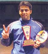 Vaneet Chopra of State Bank of Patiala, winner of the mens singles title in the 16th Punjab State Ranking Table Tennis Tournament held in Ludhiana on Sunday