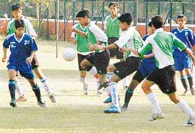 Football match in progress between the Chandigarh Football Academy, Sector 42, and Khalsa Football Academy, Kurali, at the football ground, Sector 17, on Monday.