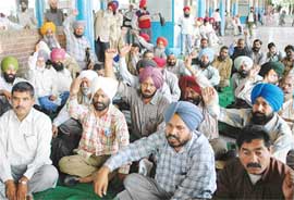 A rally organised by the CTU Conductors Union at the Sector 17 bus stand in Chandigarh on Monday. 