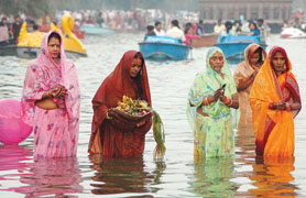 Devotees pray to the Sun God on the occasion of Chhath in the Capital on Monday.