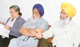Mr Sukhdev Singh Dhindsa, former union minister and President, Cycling Federation of India, with Mr J.S. Grewal, addresses a press conference in Ludhiana on Sunday night